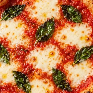 The middle of a Margherita: pools of fresh mozzarella and San Marzano tomato